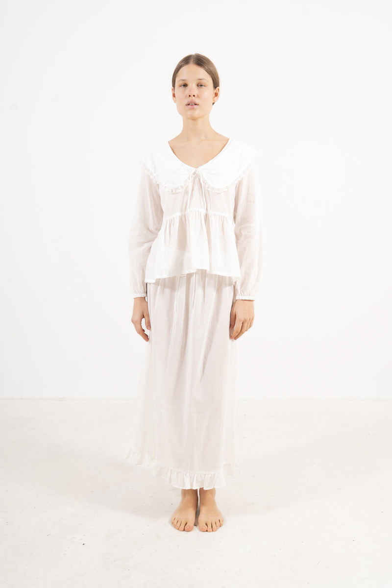Front view studio portrait featuring a model in the Élodie set by MOCHA, embodying understated femininity and quiet ease.