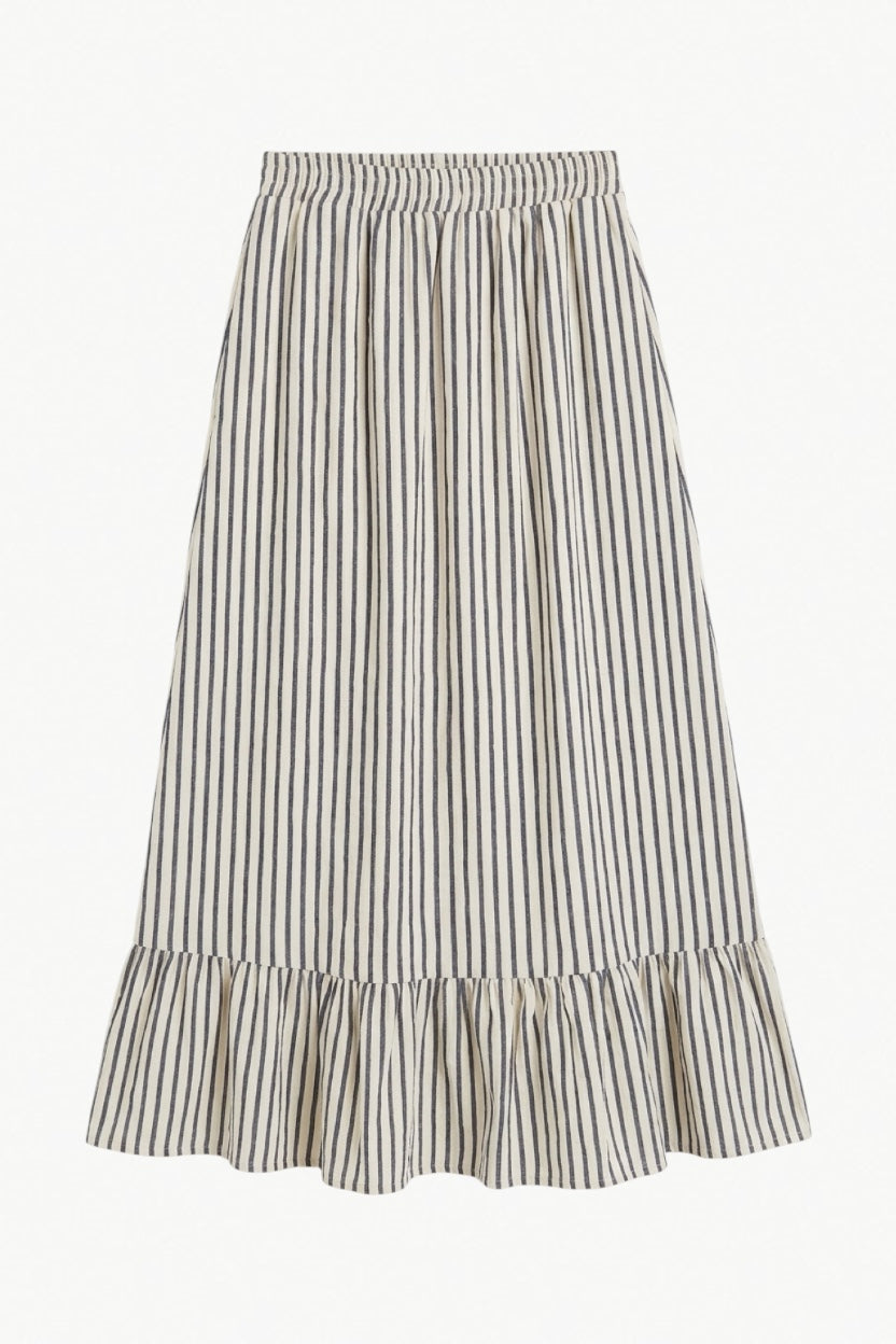 Minimalist flat lay layout of the MOCHA Élodie skirt, showcasing the airy, striped organic cotton texture and its clean silhouette.