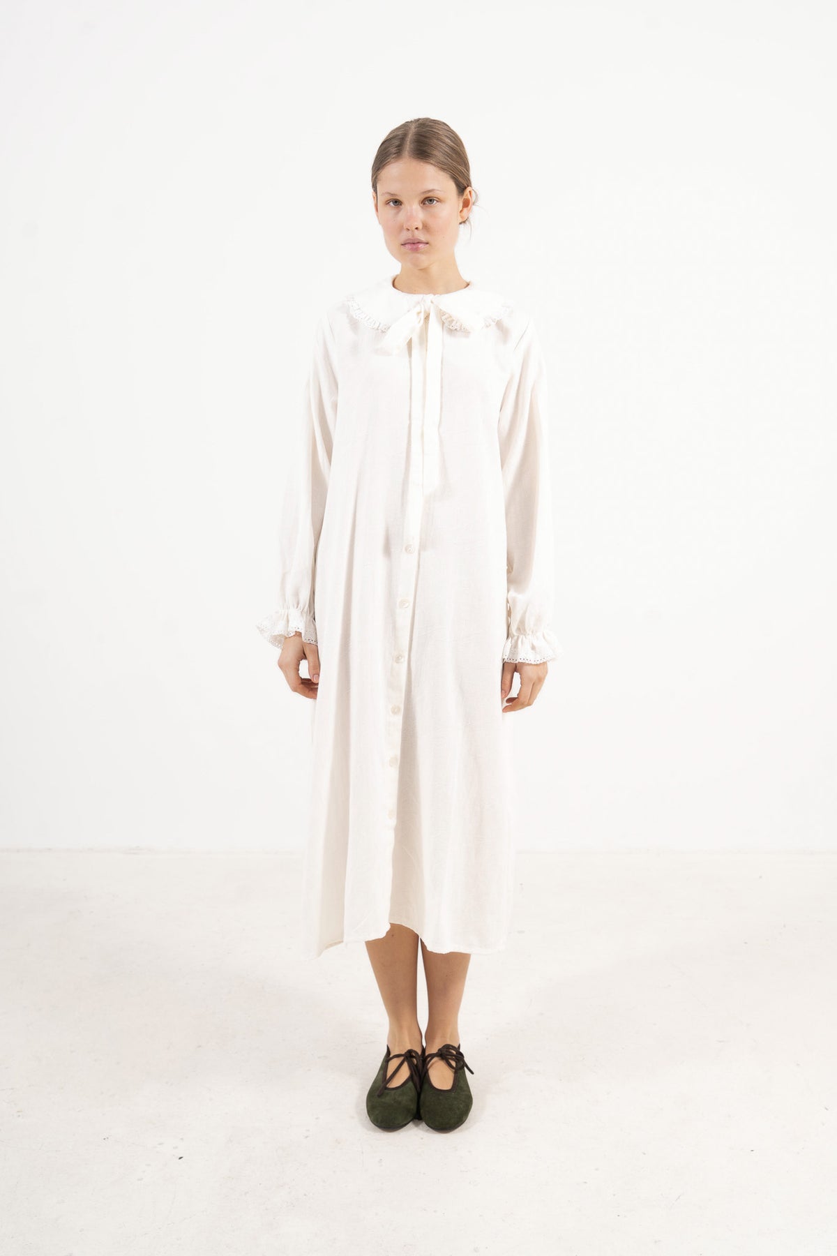 Front view lookbook portrait showcasing the effortless elegance, soft drape, and delicate collar details of the Le Souffle dress by MOCHA.