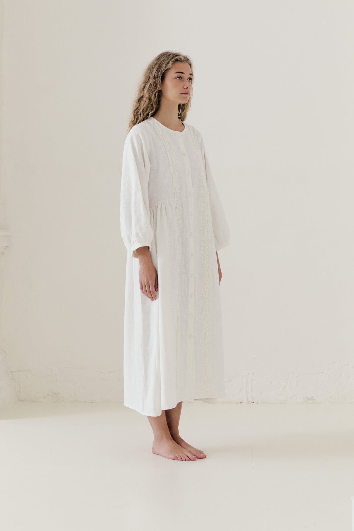  study of softened elegance and quiet luxury featuring the Madeleine Dress from the POÈME La Clémence collection by MOCHA.
