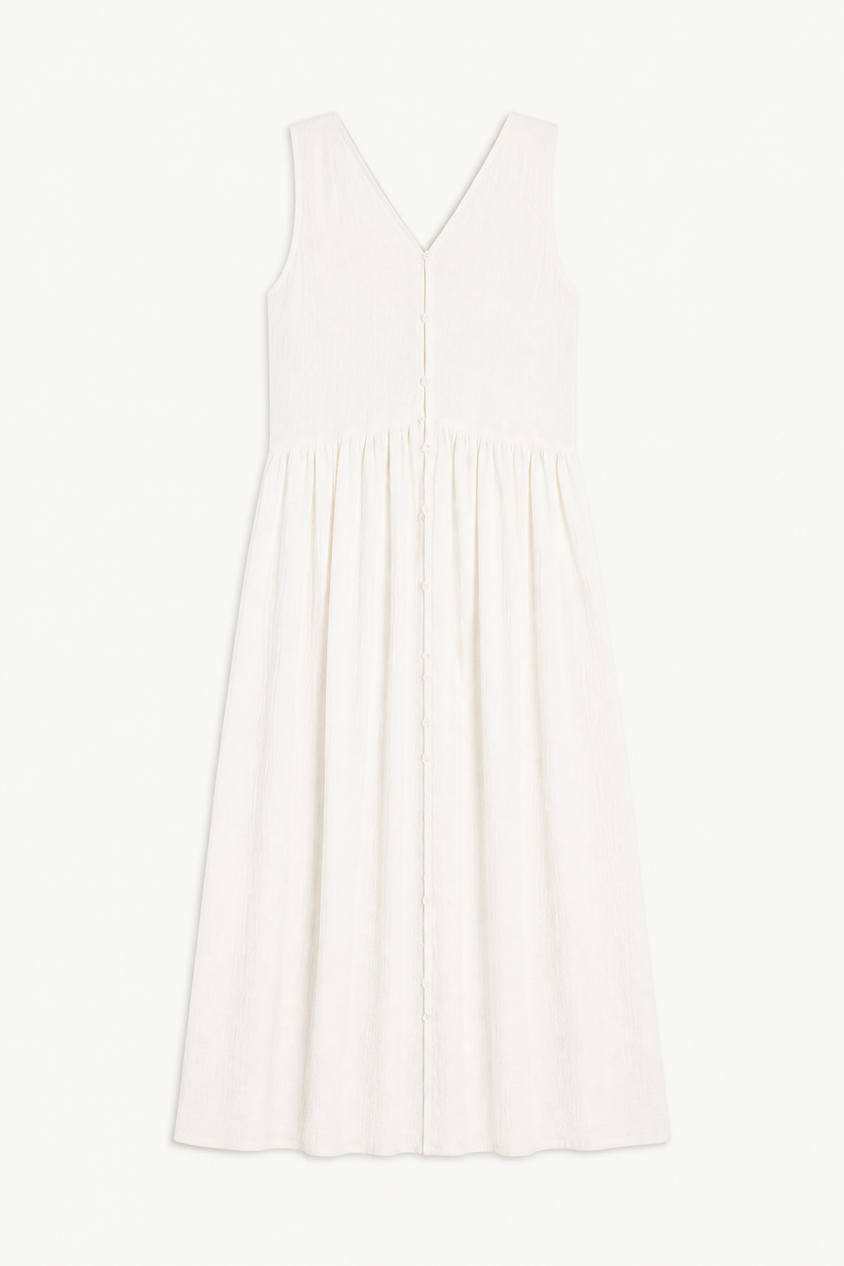 A luxurious flat layout of the MOCHA Nuage dress, capturing the exquisite drape of its premium white cotton fabric and its refined, light aesthetic.