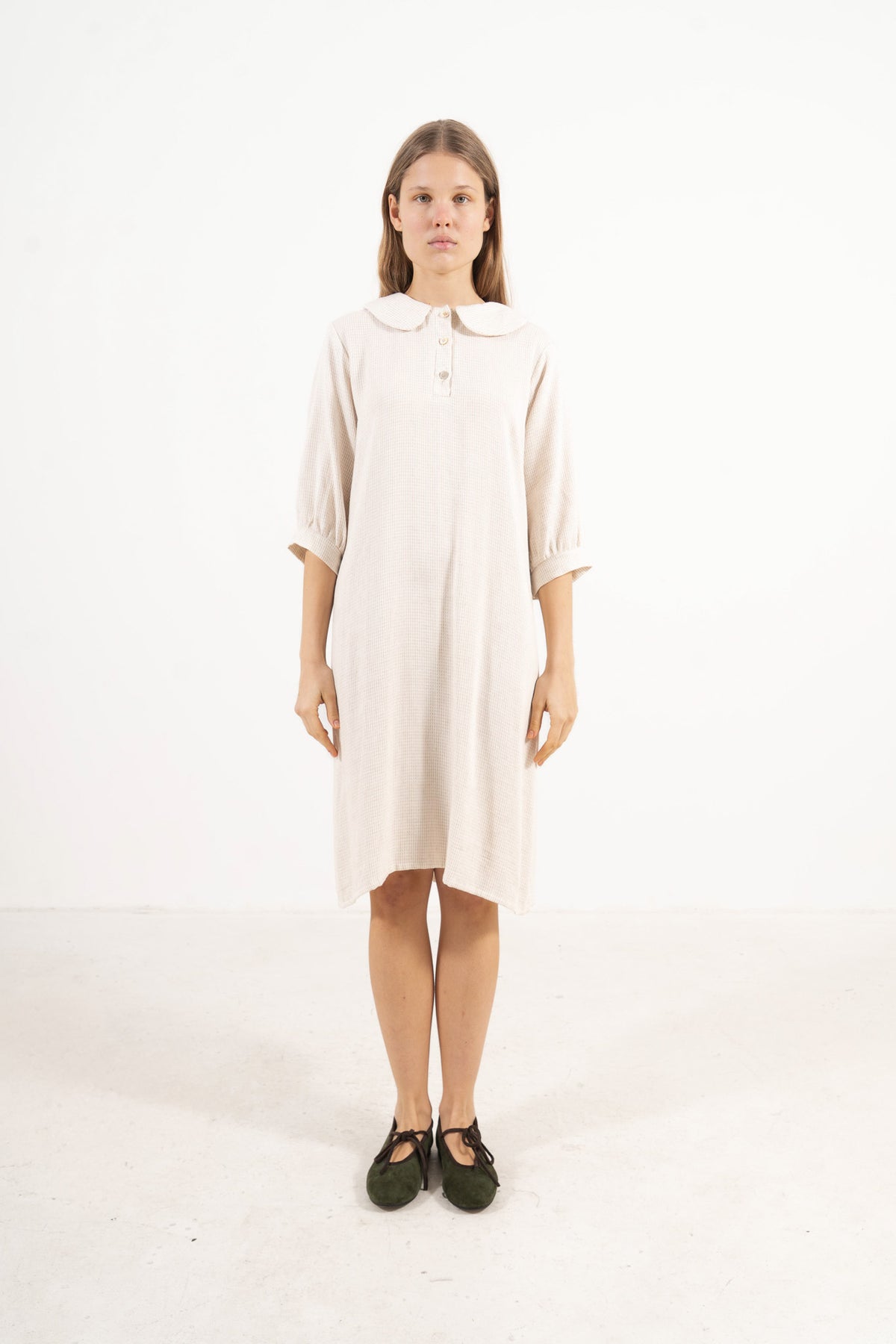 The Mielle Sleeve Dress from the POÈME La Nuit collection by MOCHA, highlighting a clean silhouette and feather-light cotton weave in a front lookbook view.